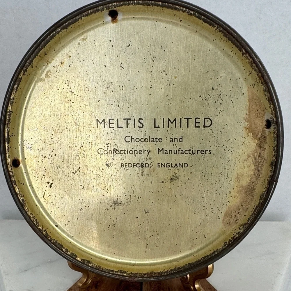 Antique Embossed Metal Meltis Limit Chocolate Tin Bedford, England